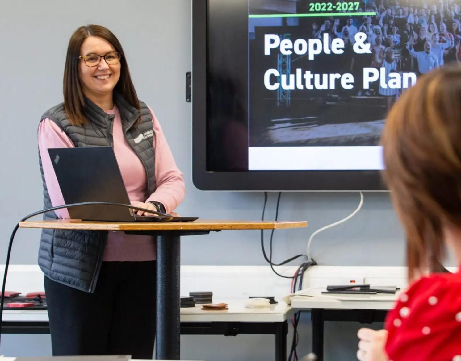 Smiley Monroe employee delivering a presentation